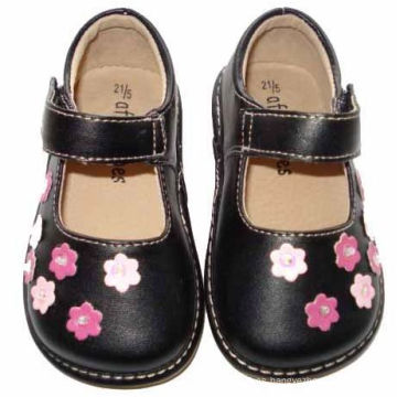 Zapatillas Squeaky Chica Negro Niño con pequeñas flores de color rosa